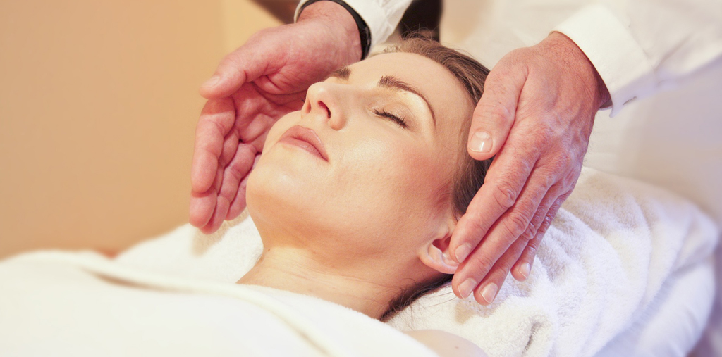 reiki-healing woman receiving reiki