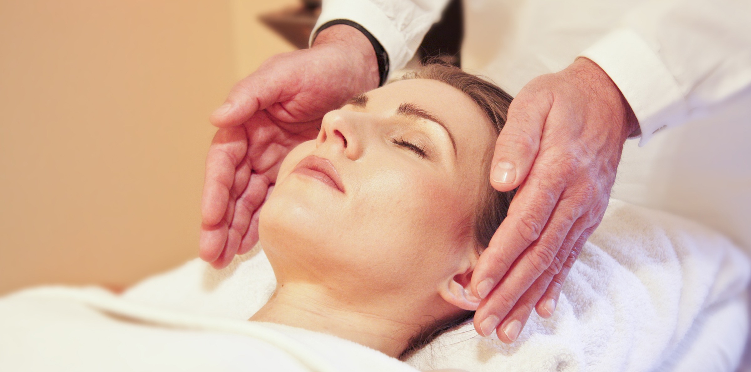 reiki-wellness-full-size-v2 woman receiving reiki