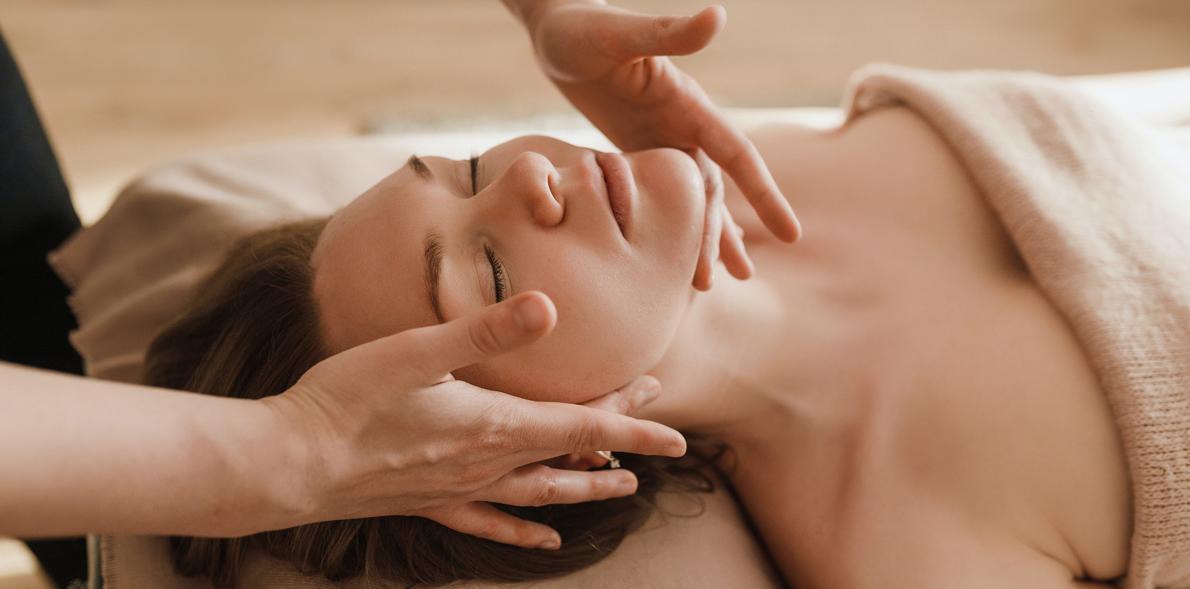 relaxation-massage woman receiving face massage