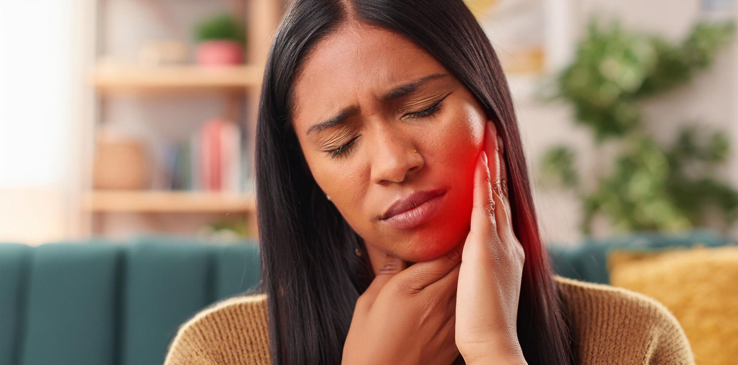 woman-with-tmj-pain woman with obvious jaw pain